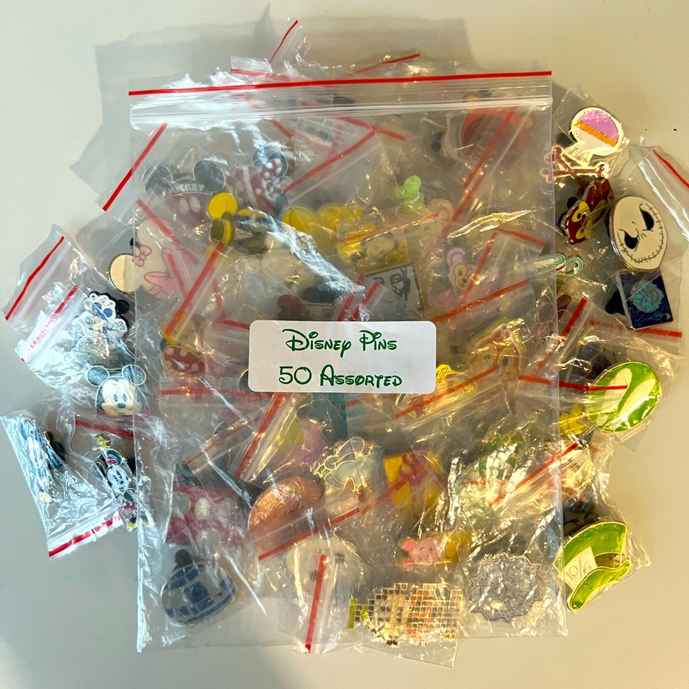 Disney collector pins with Mickey rubber backings